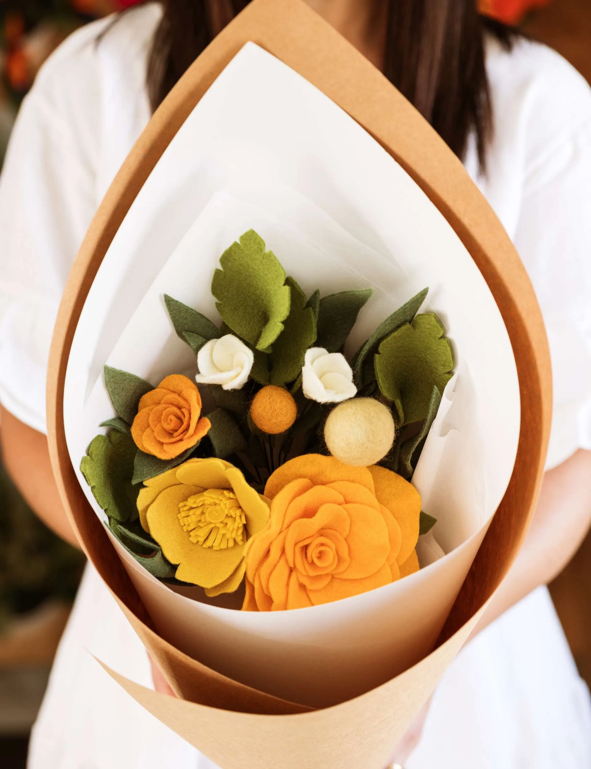 Yellow felt flowers in a bouquet 