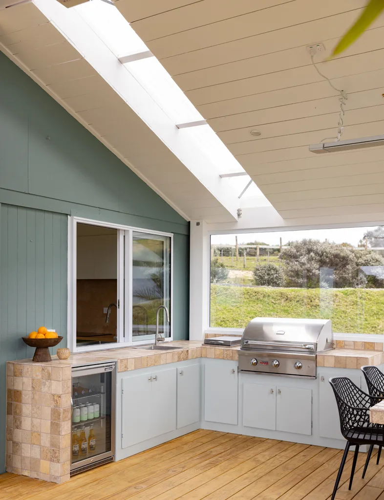 Outdoor area with an outdoor kitchen and barbecue