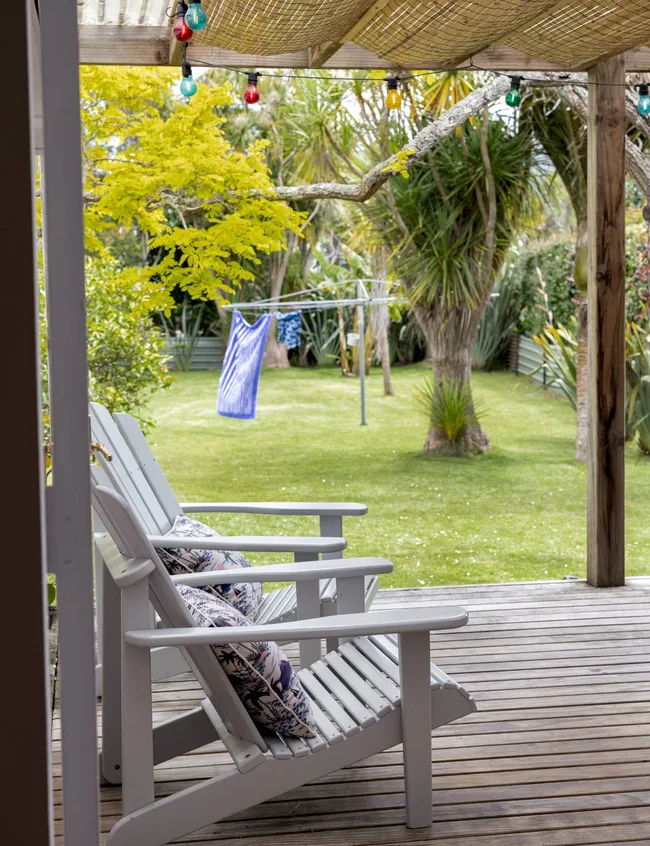 The view from the deck across the lawn with a washing line in the middle