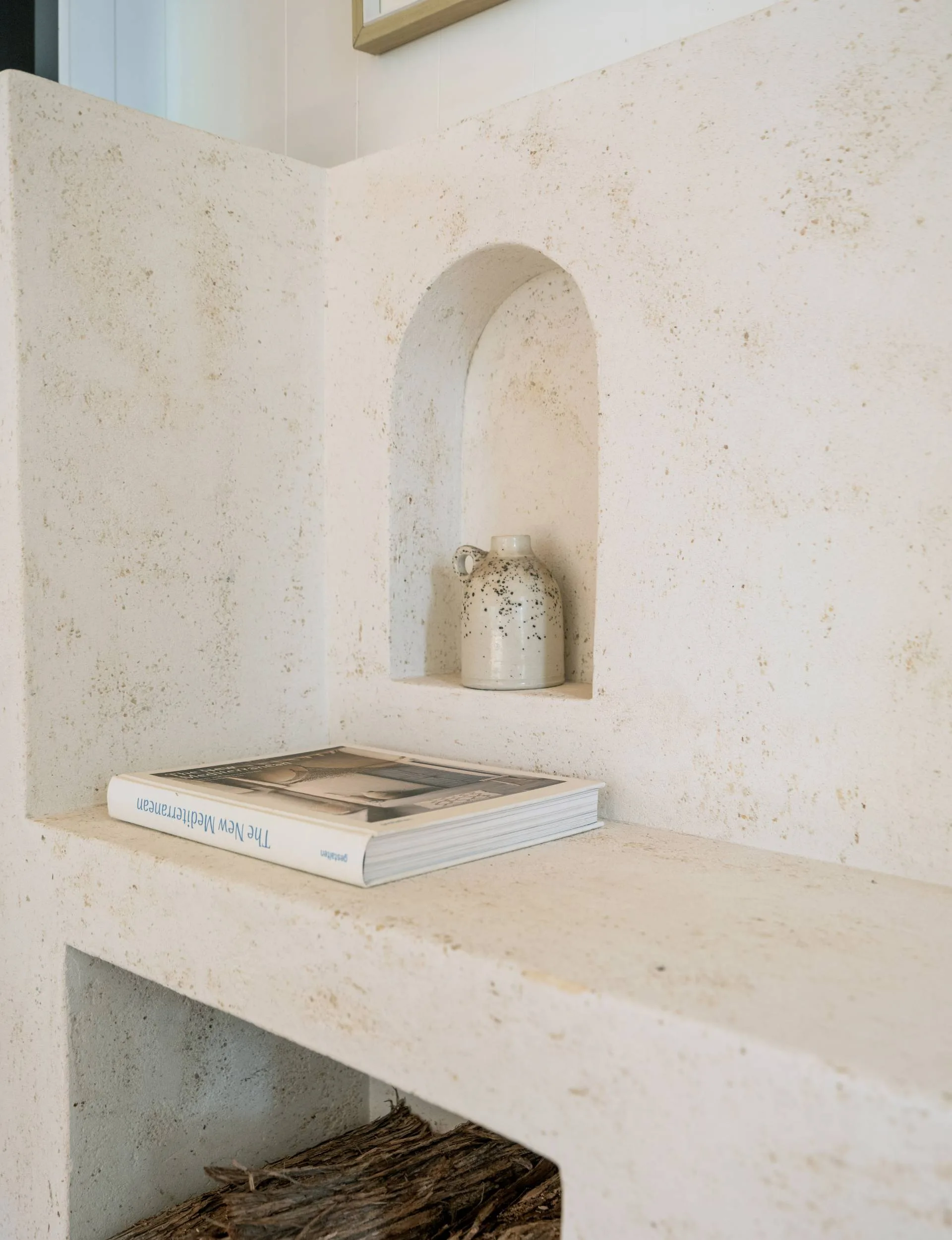 A Mediterranean style design book on a shelf