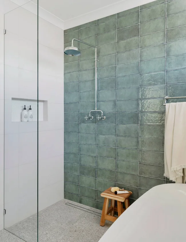 A green and white bathroom