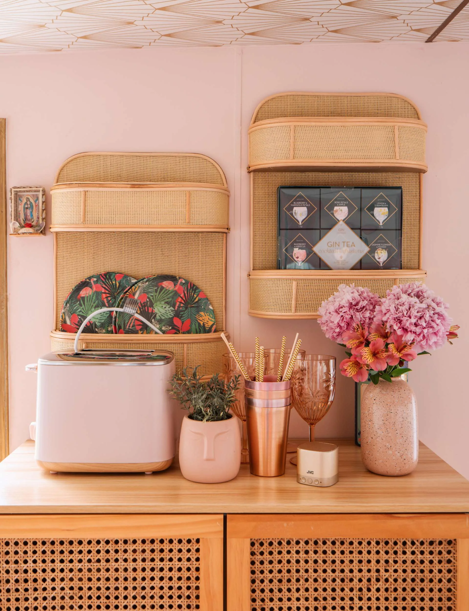 Pink objects with rattan furniture
