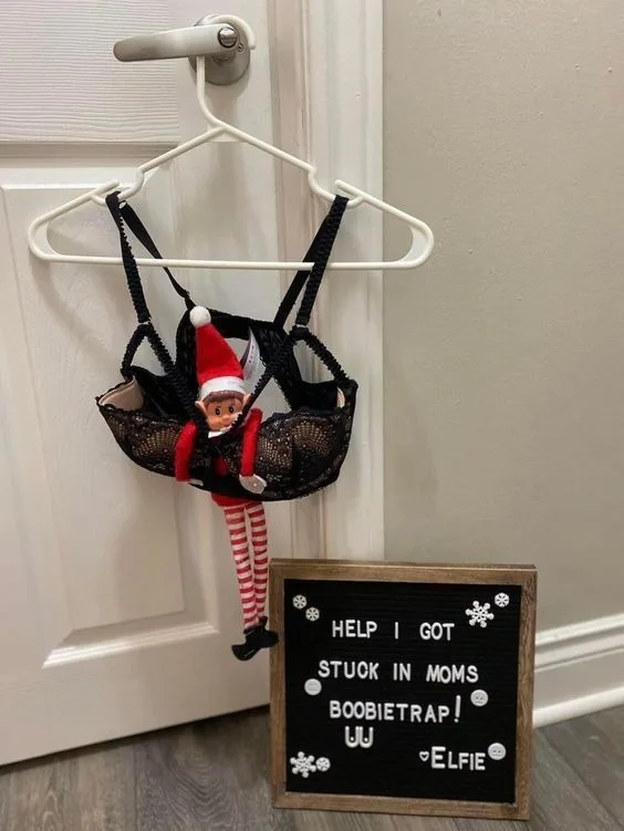 An Elf on the Shelf stuck in a bra