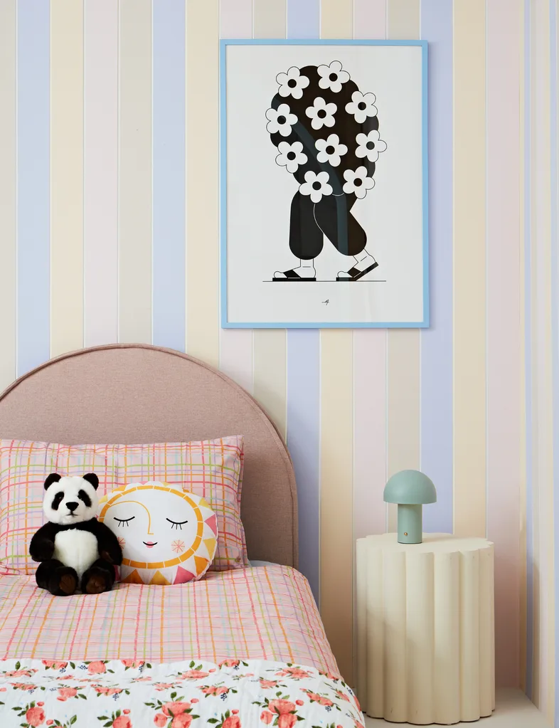 Kid's bedroom with striped wall in soft sorbet colours