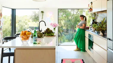 Christchurch Homeowner Liz in her kitchen after the renovation