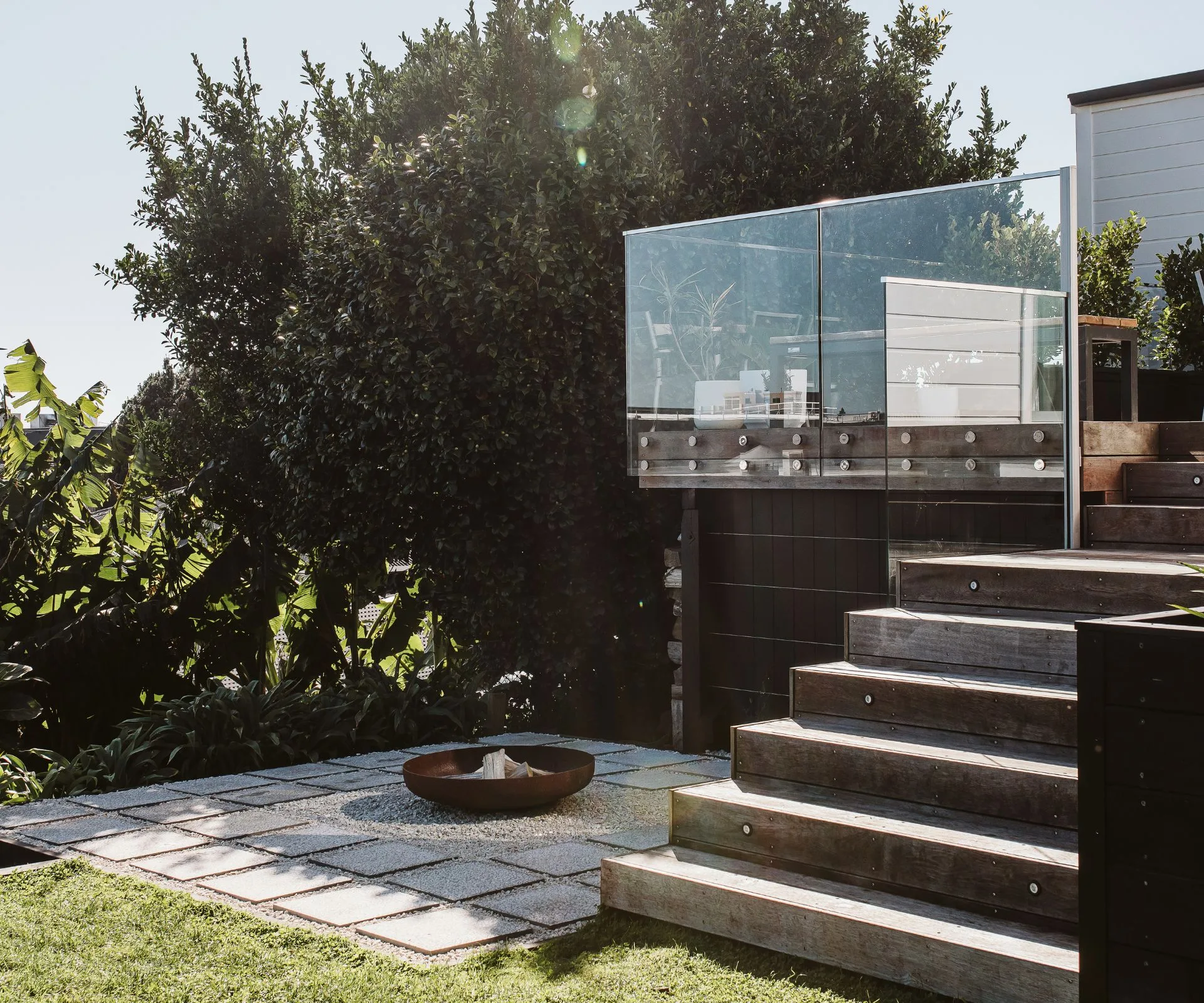 The balcony and fire pit of the renovated New Plymouth villa