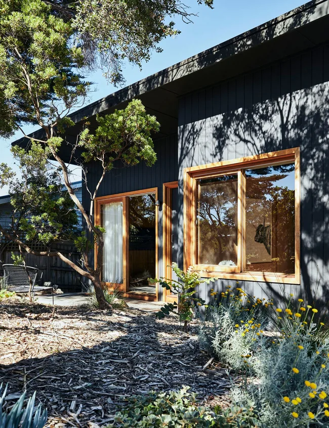 The exterior of the renovated beach cabin