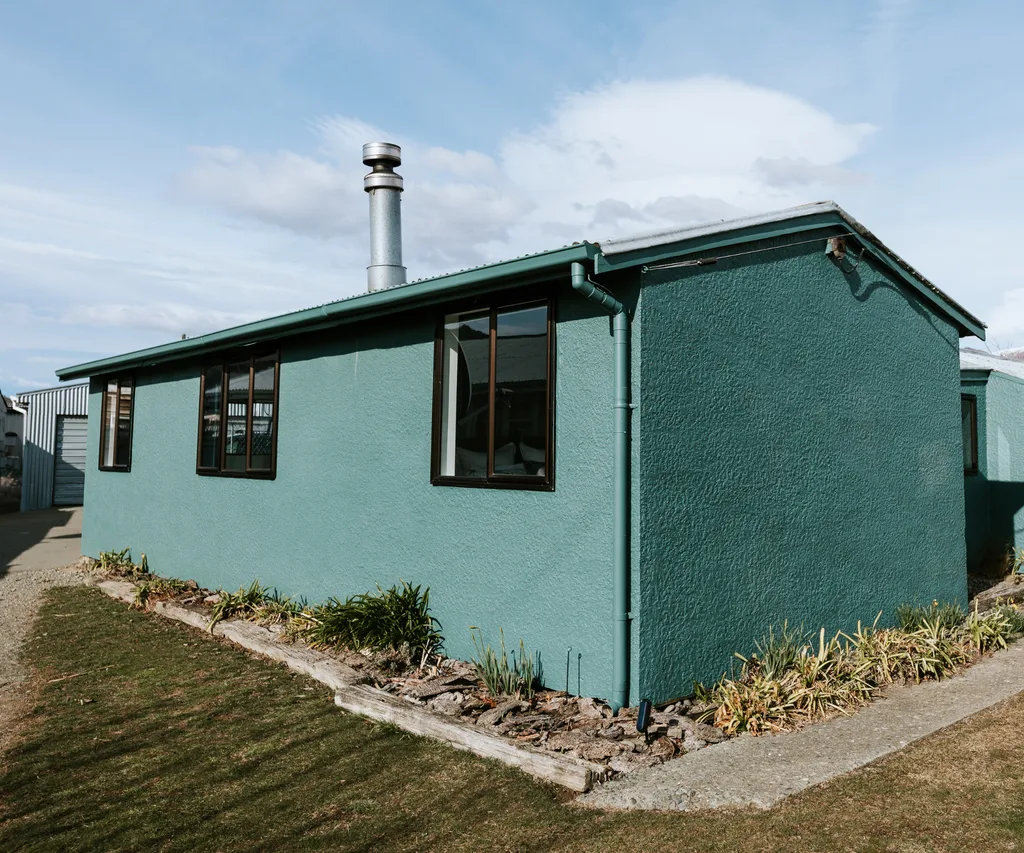The exterior of the winning Colour Home Awards home is painted in Resene Green Meets Blue