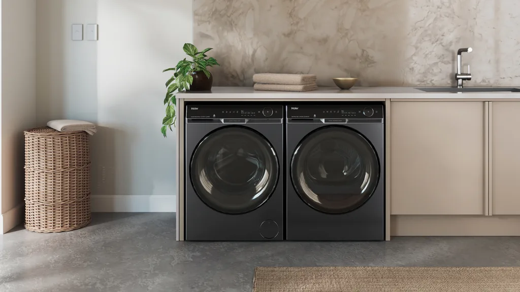 The Haier Front Load Washer and Heat Pump Dryer in laundry room