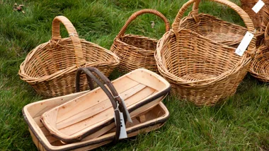 Trugs and baskets on a lawn