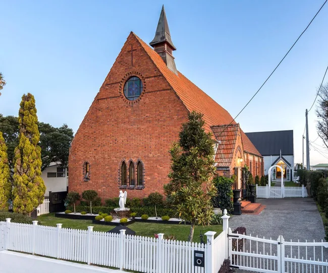 A church turned house in brick cladding