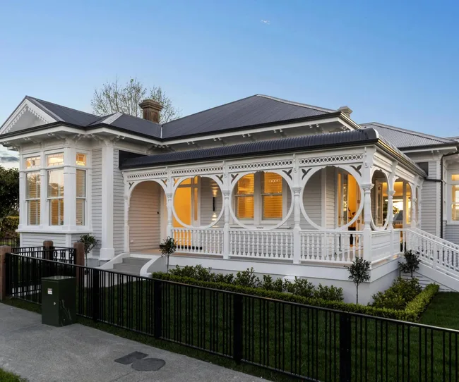 A white painted villa at dusk