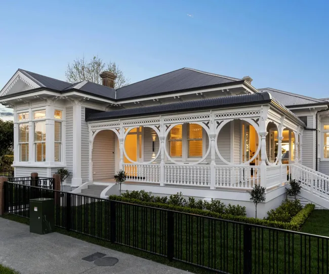 A white painted villa at dusk