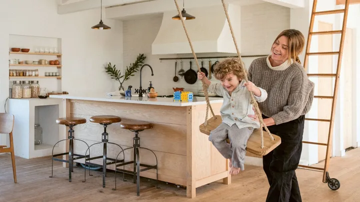 This Scandi-chic Californian home provides oodles of fun with a swing in the kitchen