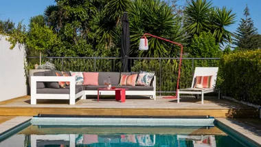 The pool and poolside loungers at the Mt Eden home