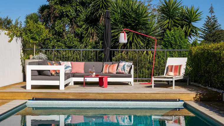 The pool and poolside loungers at the Mt Eden home