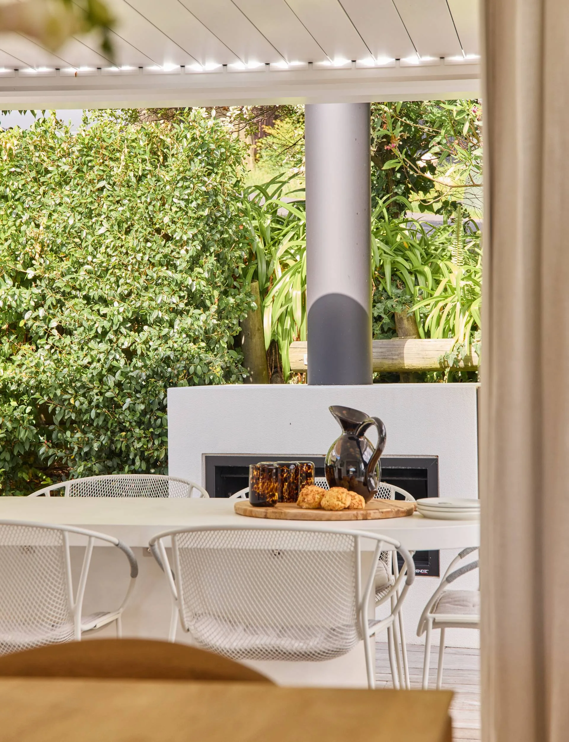 The outdoor dining area beside an outdoor fire