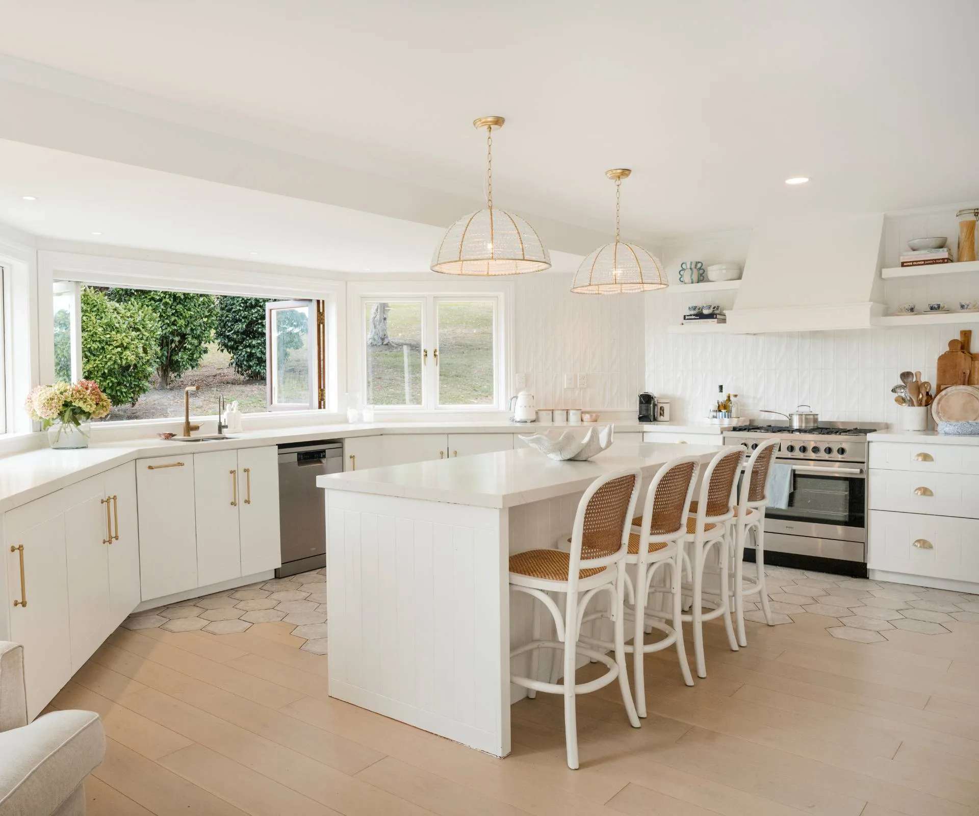 The white and wooden Auckland homestead kitchen