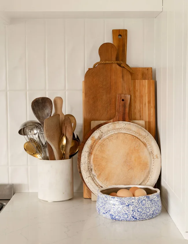 Wooden cutting boards stacked in the Auckland homestead kitchen
