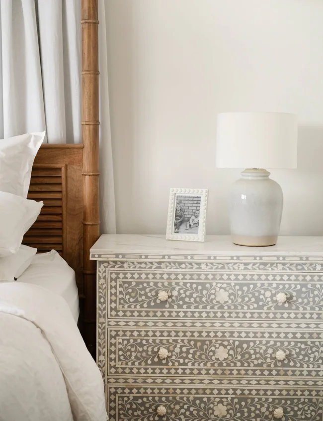 A crocodile print bedside table in the Auckland Homestead