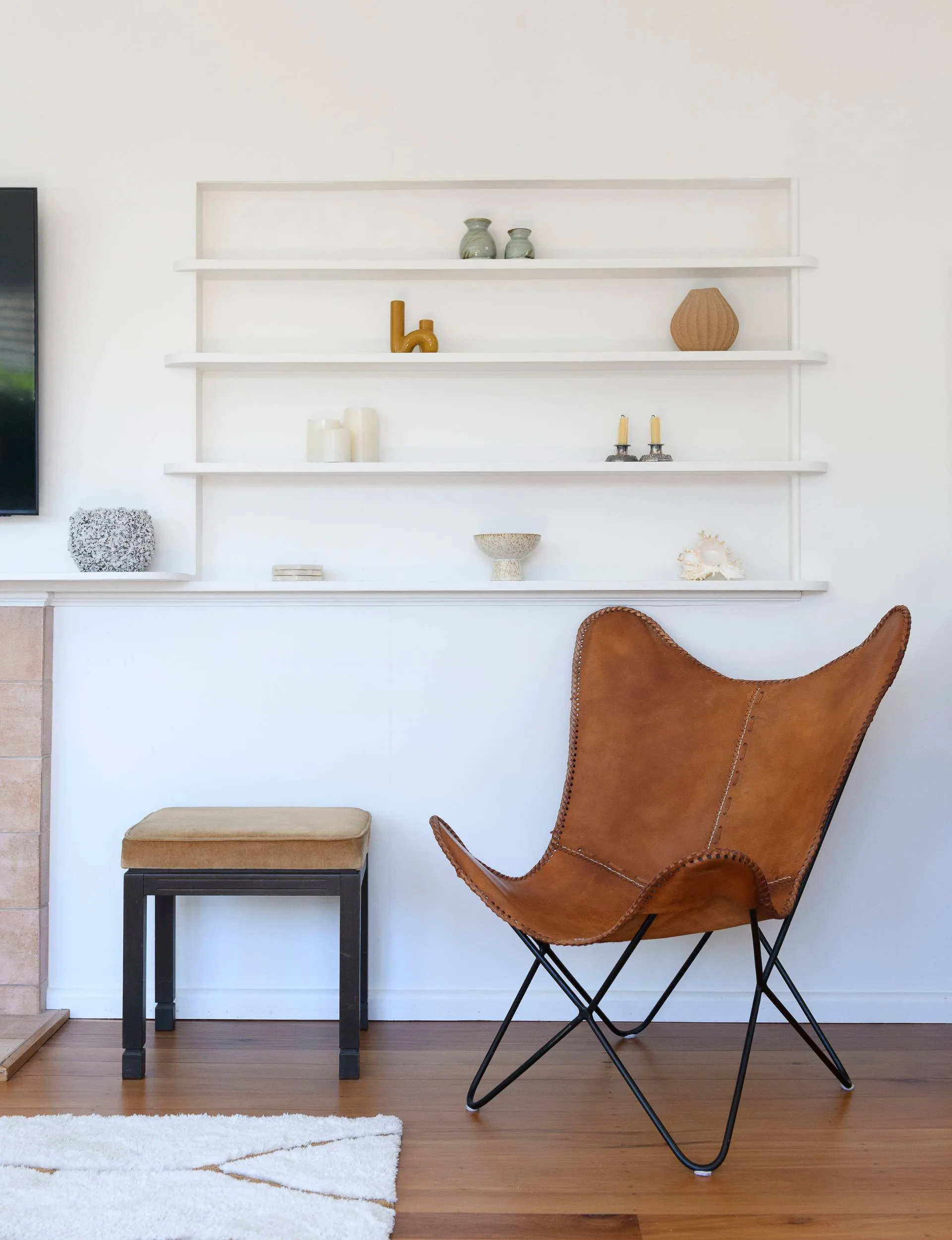 A leather chair in the corner of the lounge