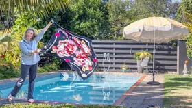 Photographic artist Emma Bass’ garden is a vibrant, sub-tropical haven