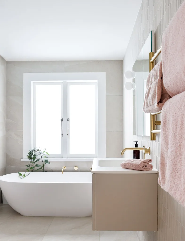 The bathroom in the Devonport villa with a beautiful bath from Stone Baths