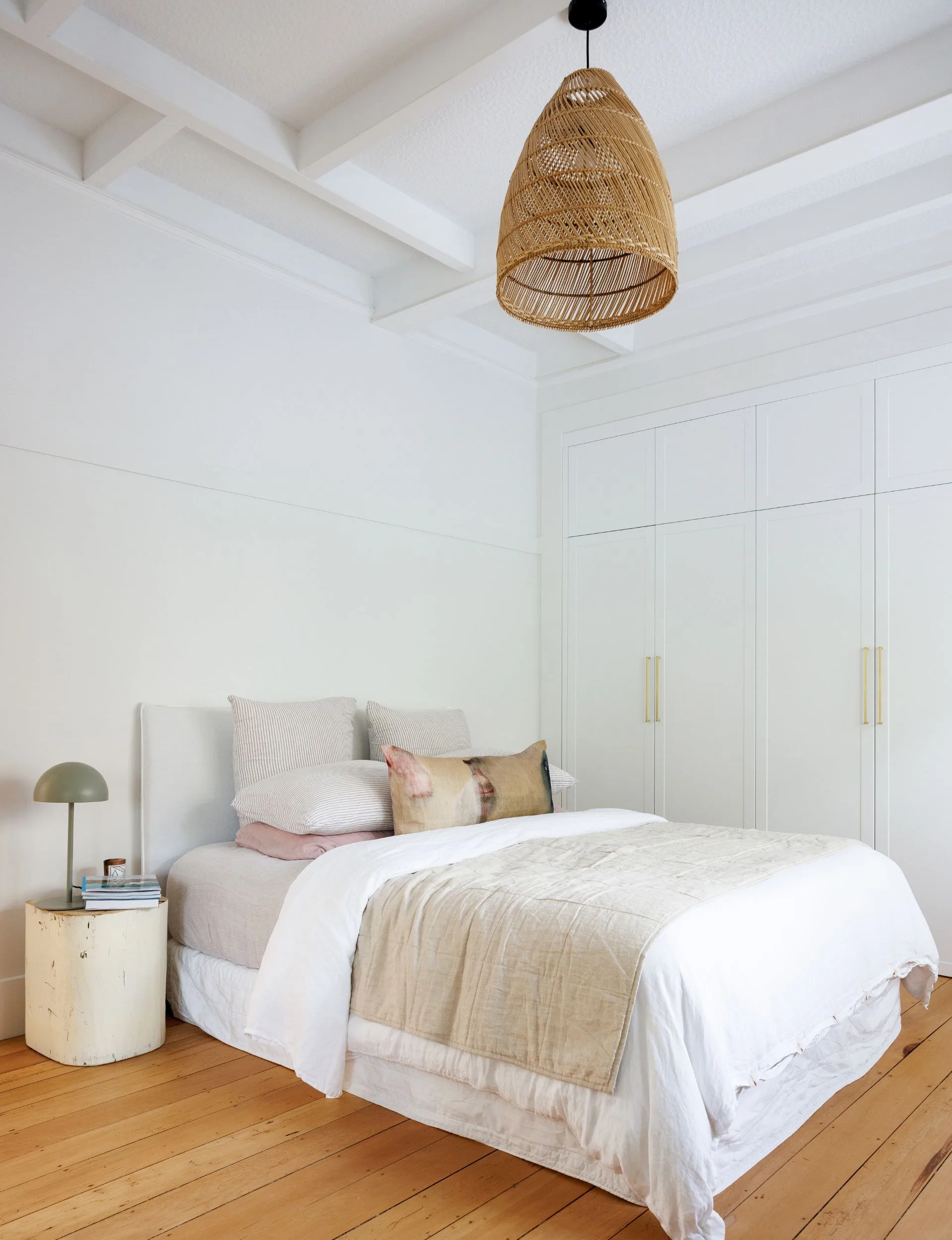 The main bedroom in the Devonport villa with Shaker-style wardrobes