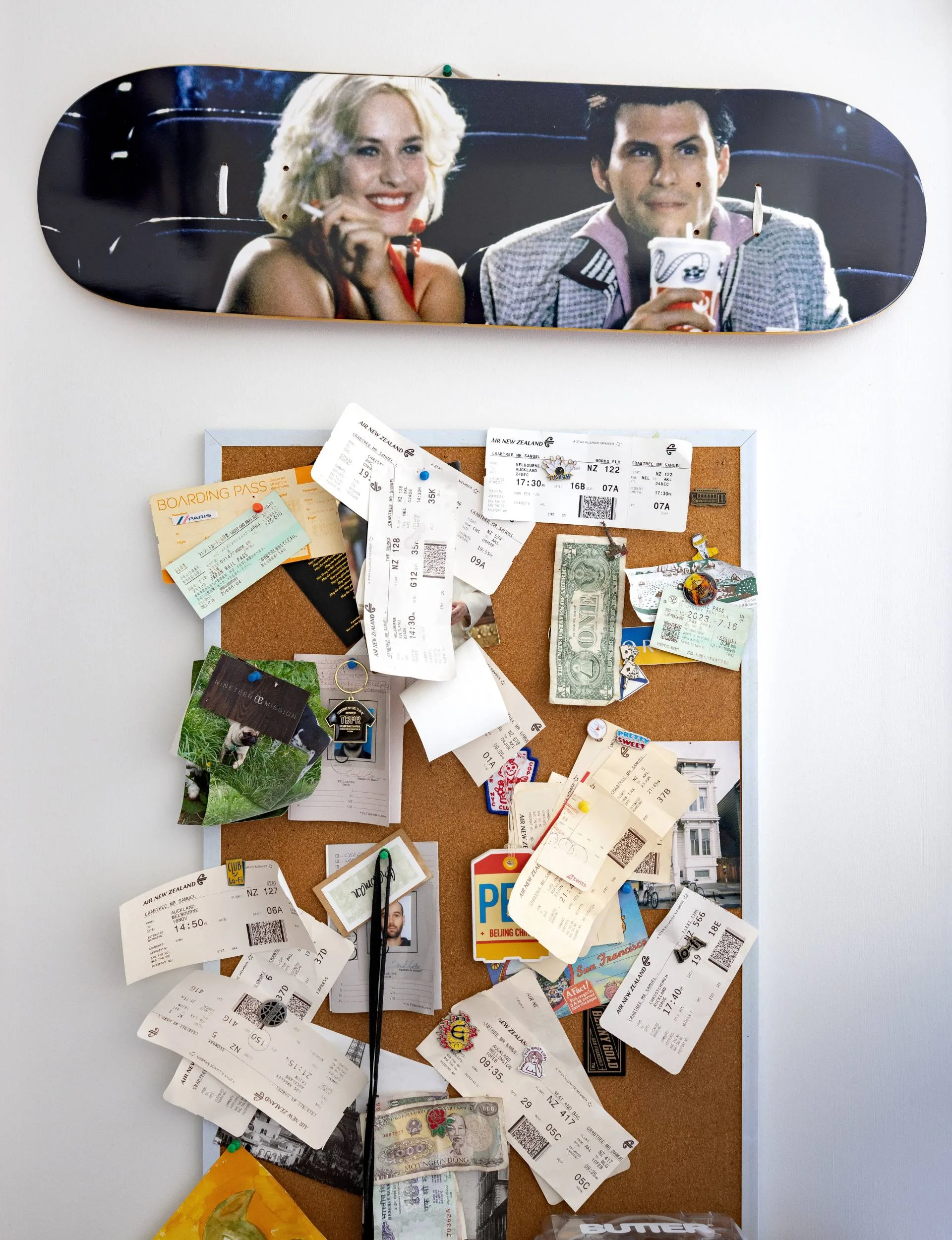 A corkboard with memorabilia