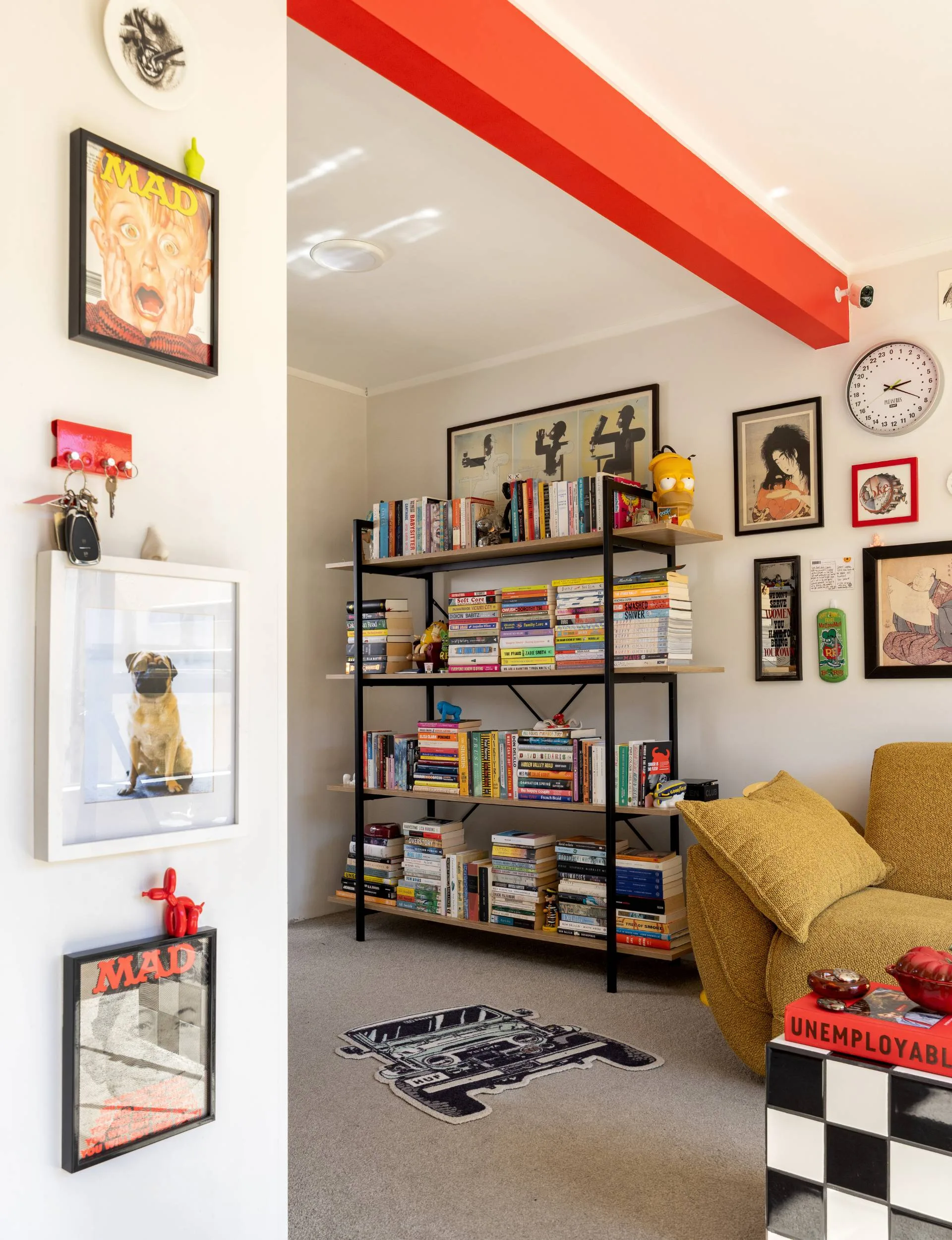 The 1970s townhouse living room with a large bookshelf