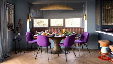 Purple statement dining chairs in the weekender apartment