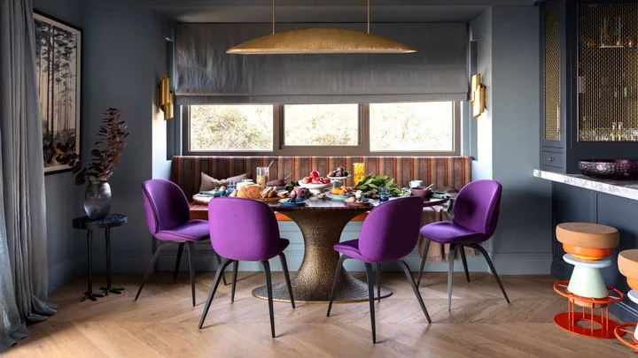 Purple statement dining chairs in the weekender apartment