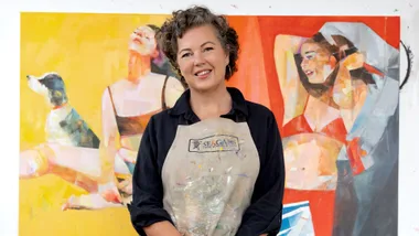 Jenni Stringleman in front of her art