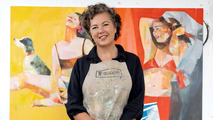 Jenni Stringleman in front of her art