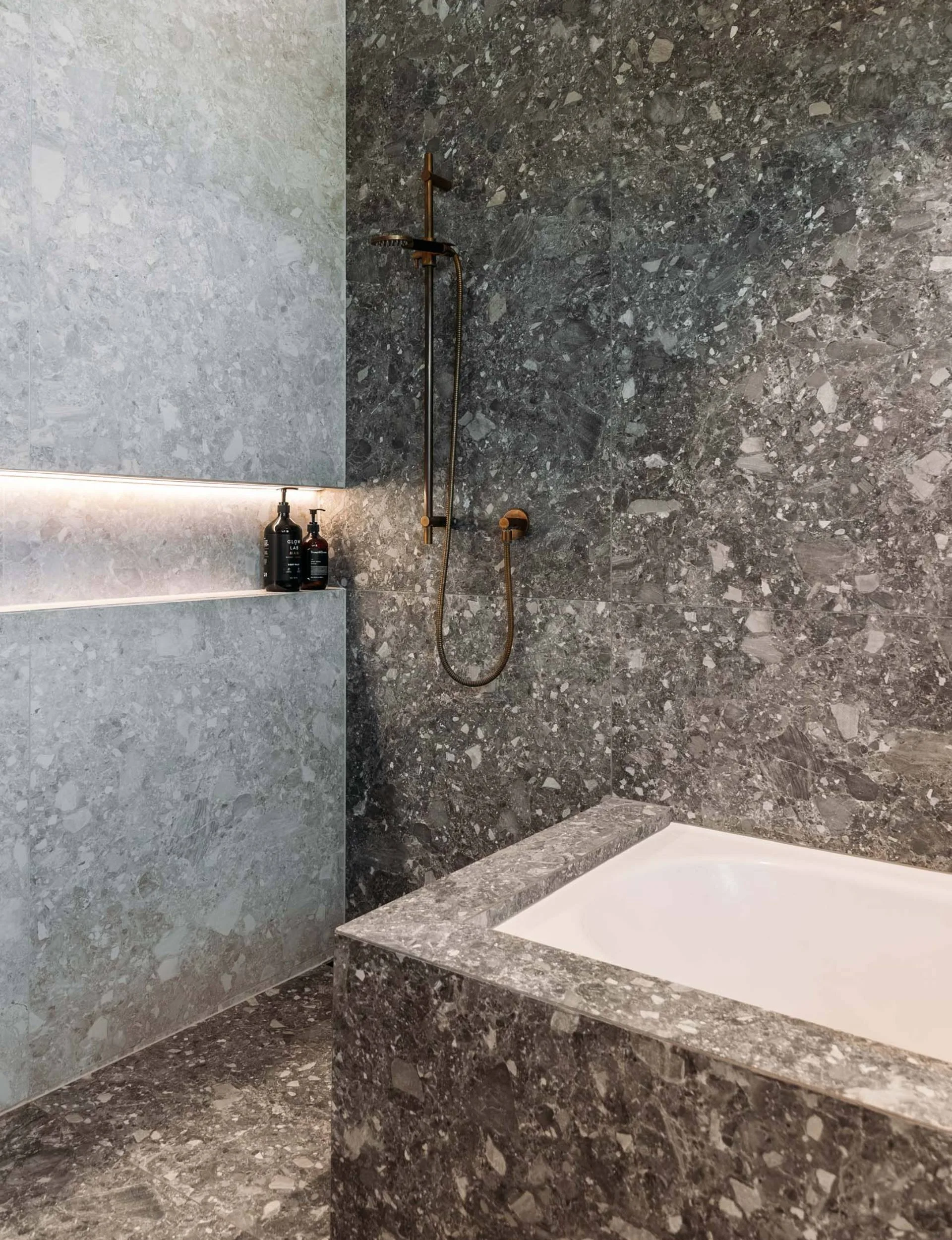 grey stone walls in the renovated Wellington bathroom