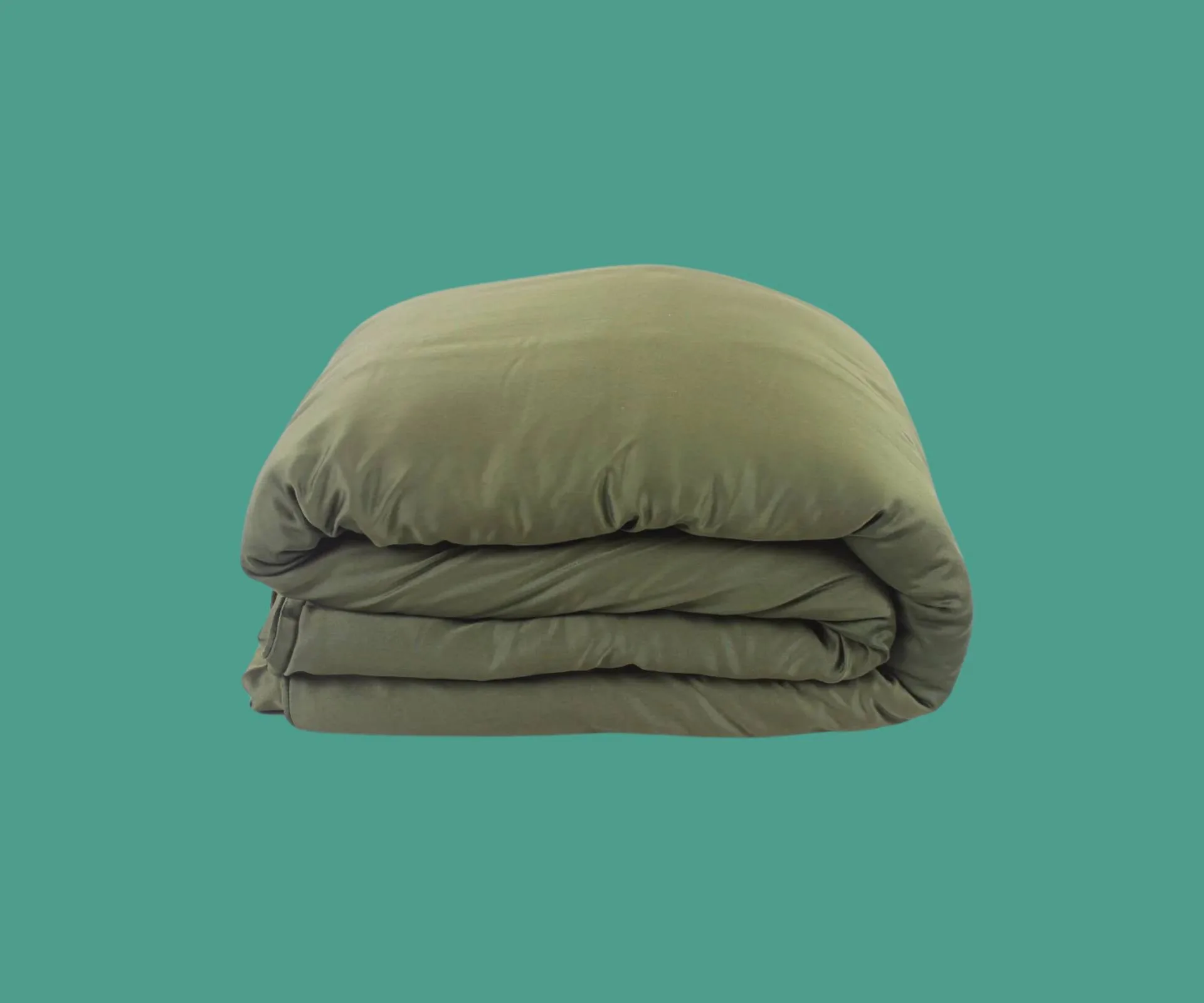 green weighted blanket folded up
