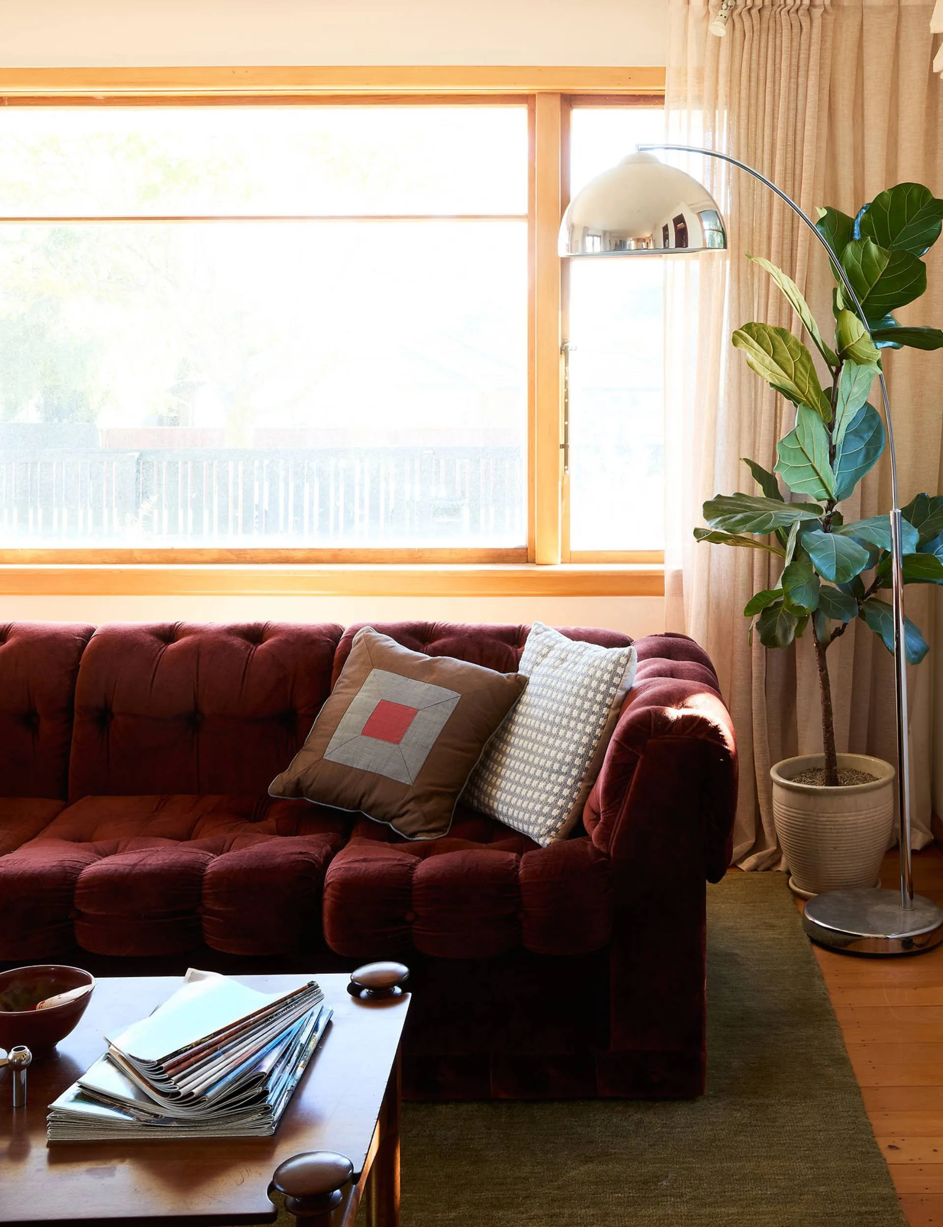 A red sofa in a living room 