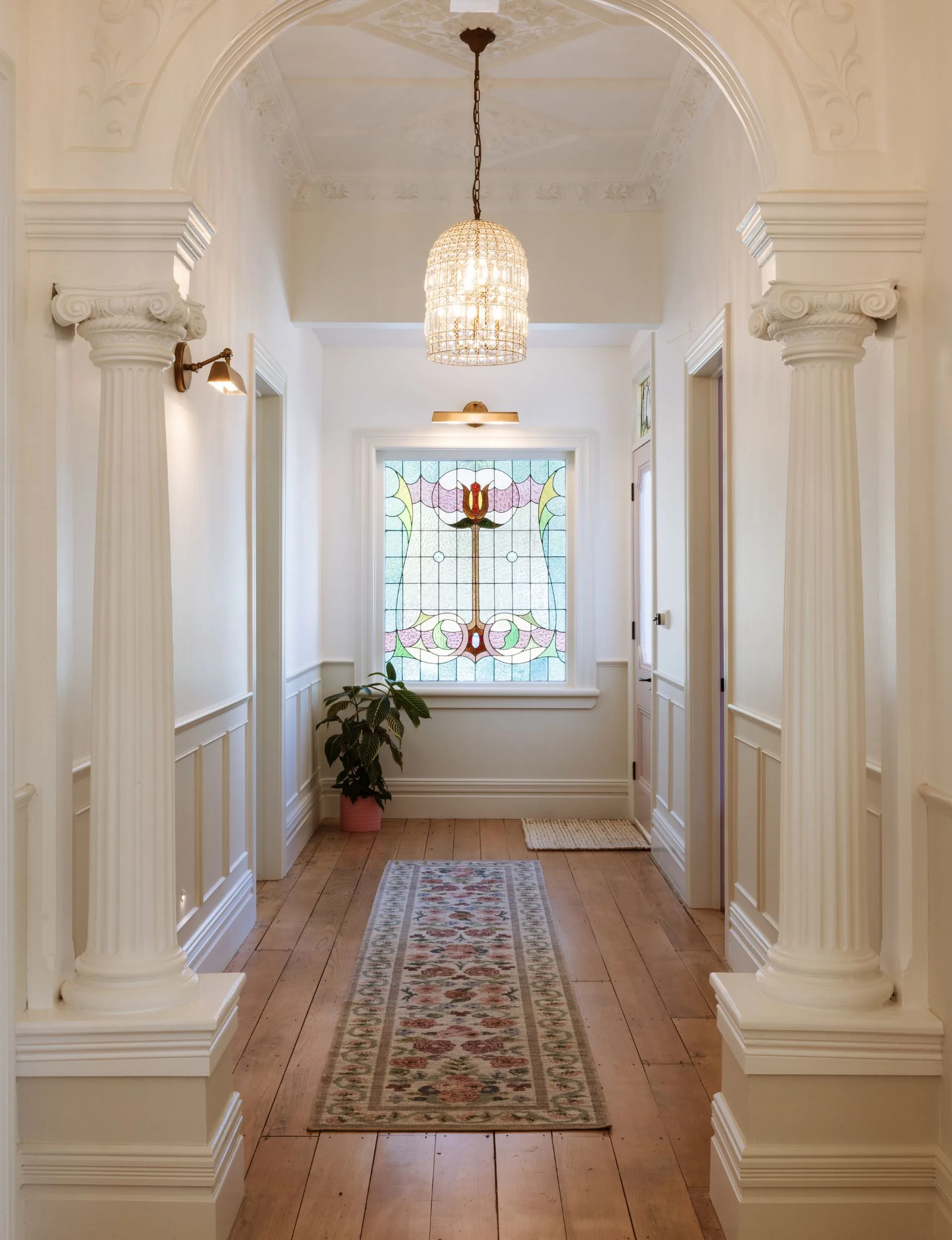 hallway with floral rug