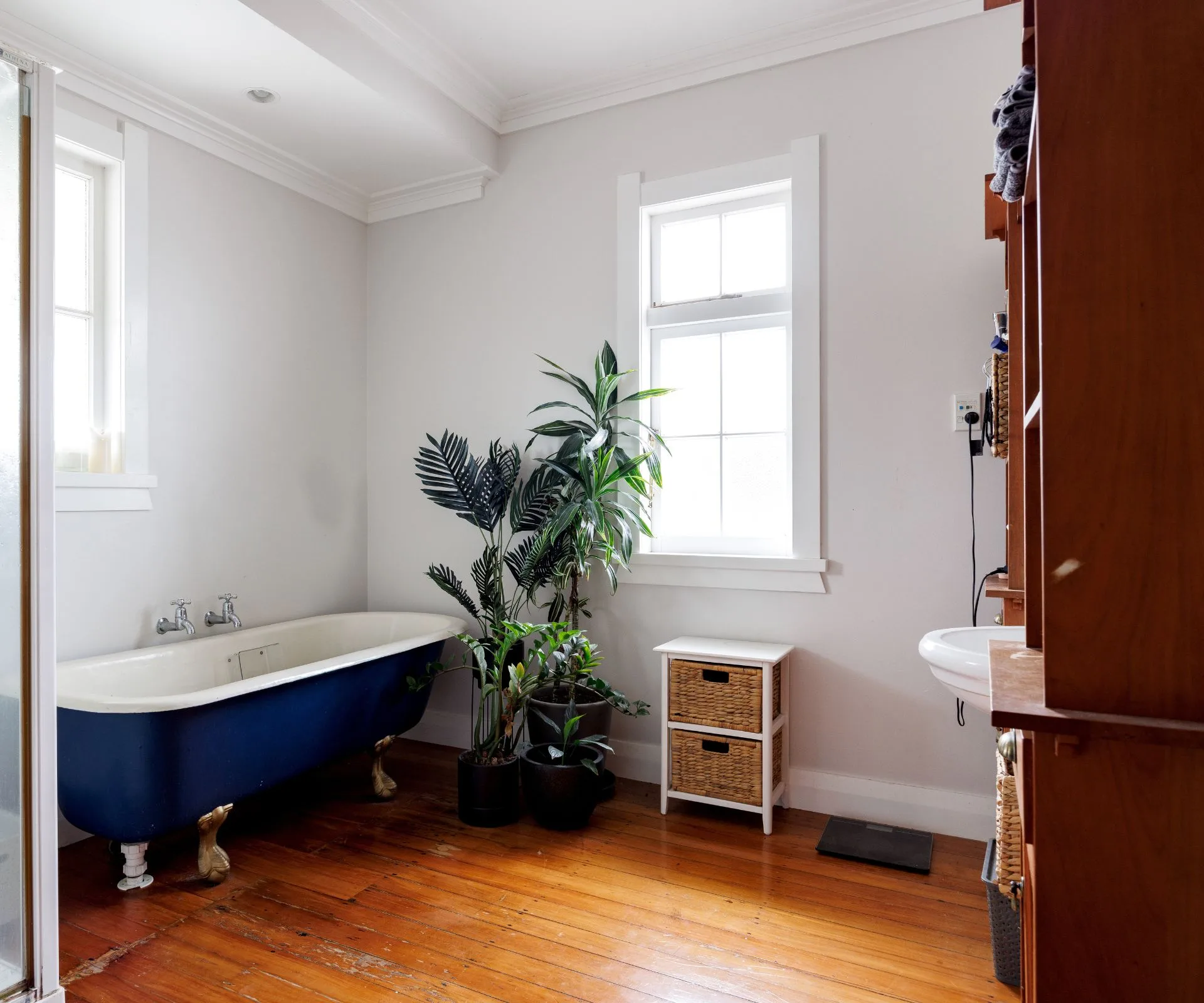 The spacious old bathroom also had an old claw-foot bathroom and wooden floors