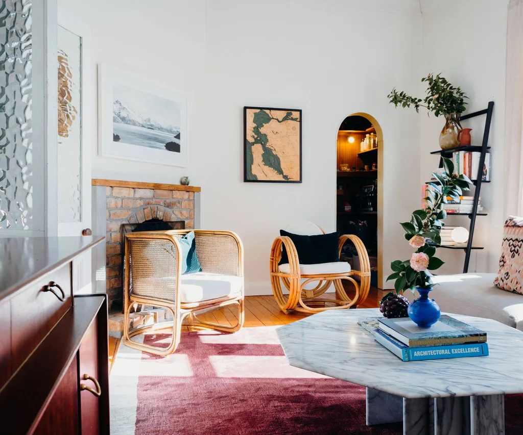 wooden cushion chair in the living room with a book shelf
