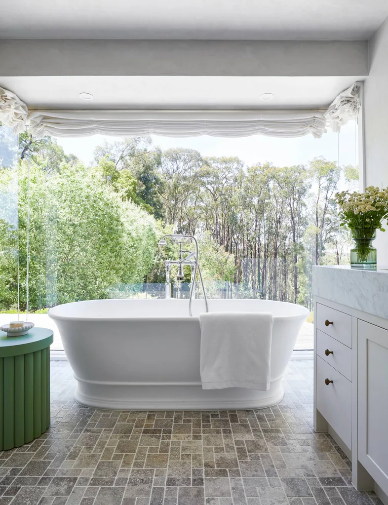 bath tub with green scenery