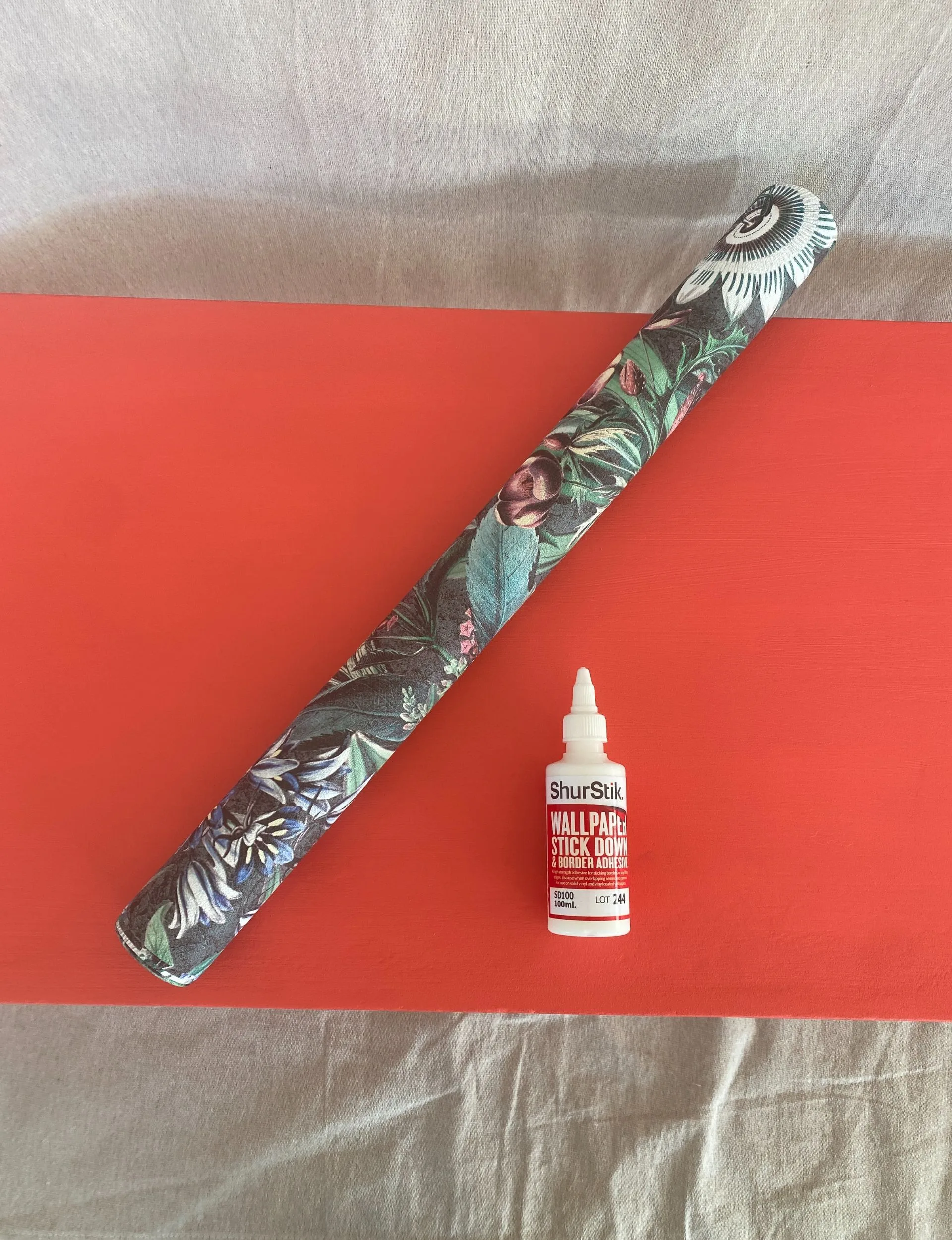 Last step, measure the wallpaper and glue to the upcycled coffee table top