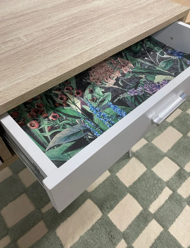 Use leftover wallpaper to line a drawer