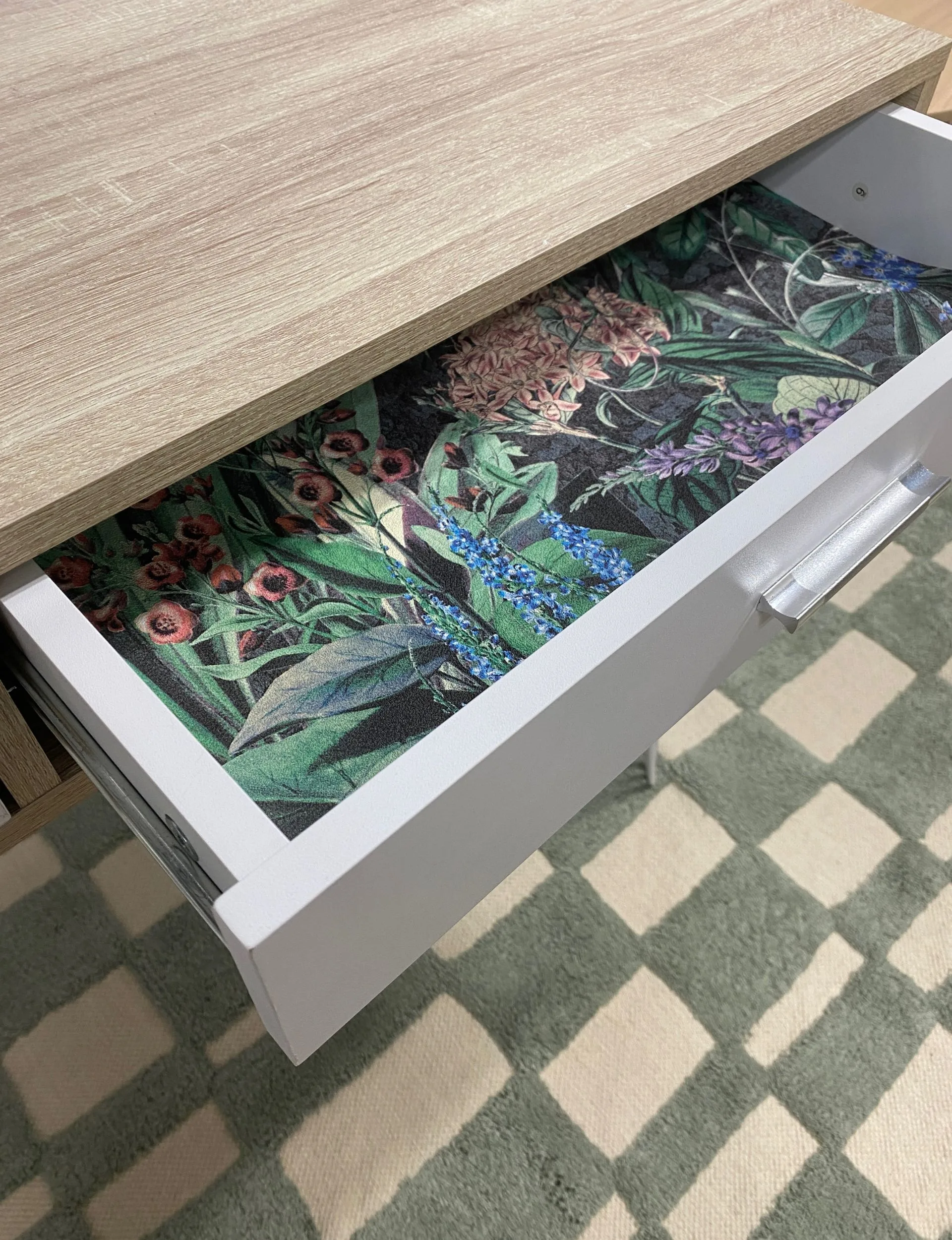 Use leftover wallpaper to line a drawer
