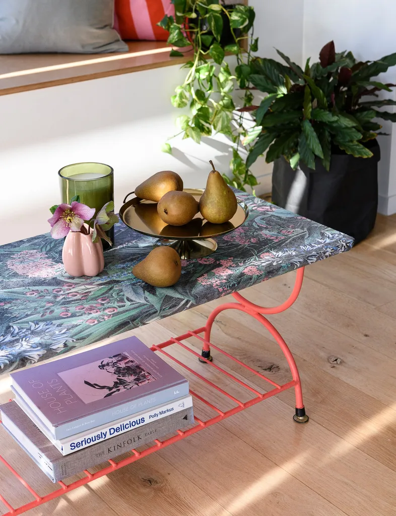 Final result of the upcycled coffee table, using a floral wallpaper and pink paint from Resene