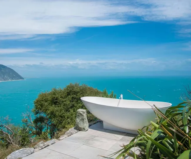 An outdoor bath looking over Tasman Bay