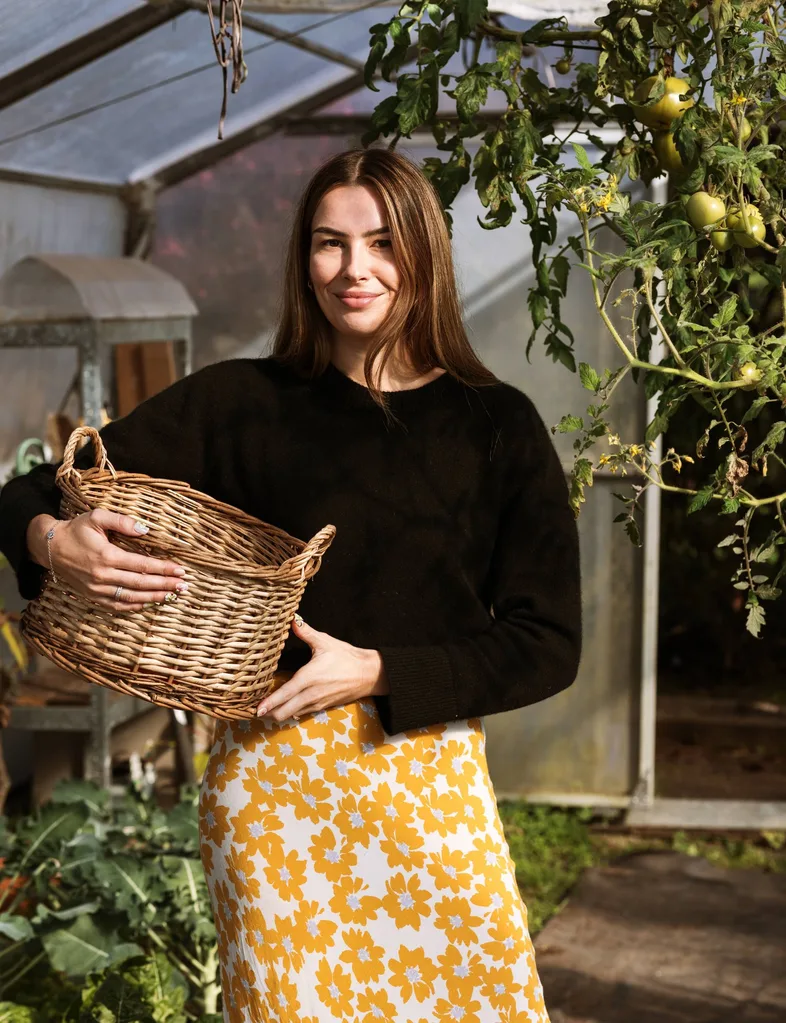 Viarni Bright in her greenhouse
