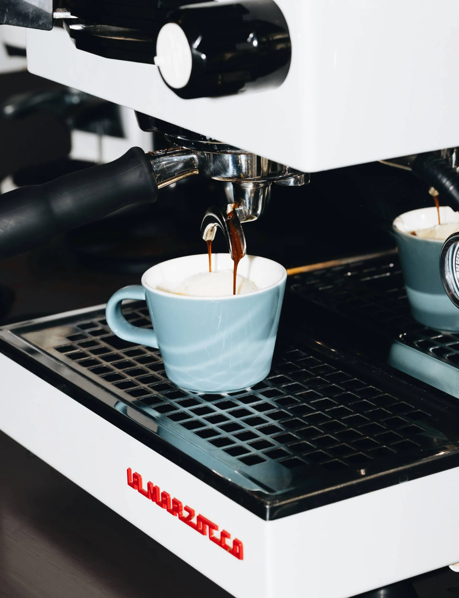 Acme coffee cup filled with coffee 