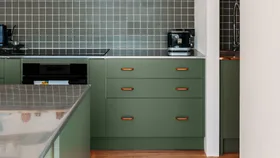 These melamine cupboards were given a fresh coat of green paint