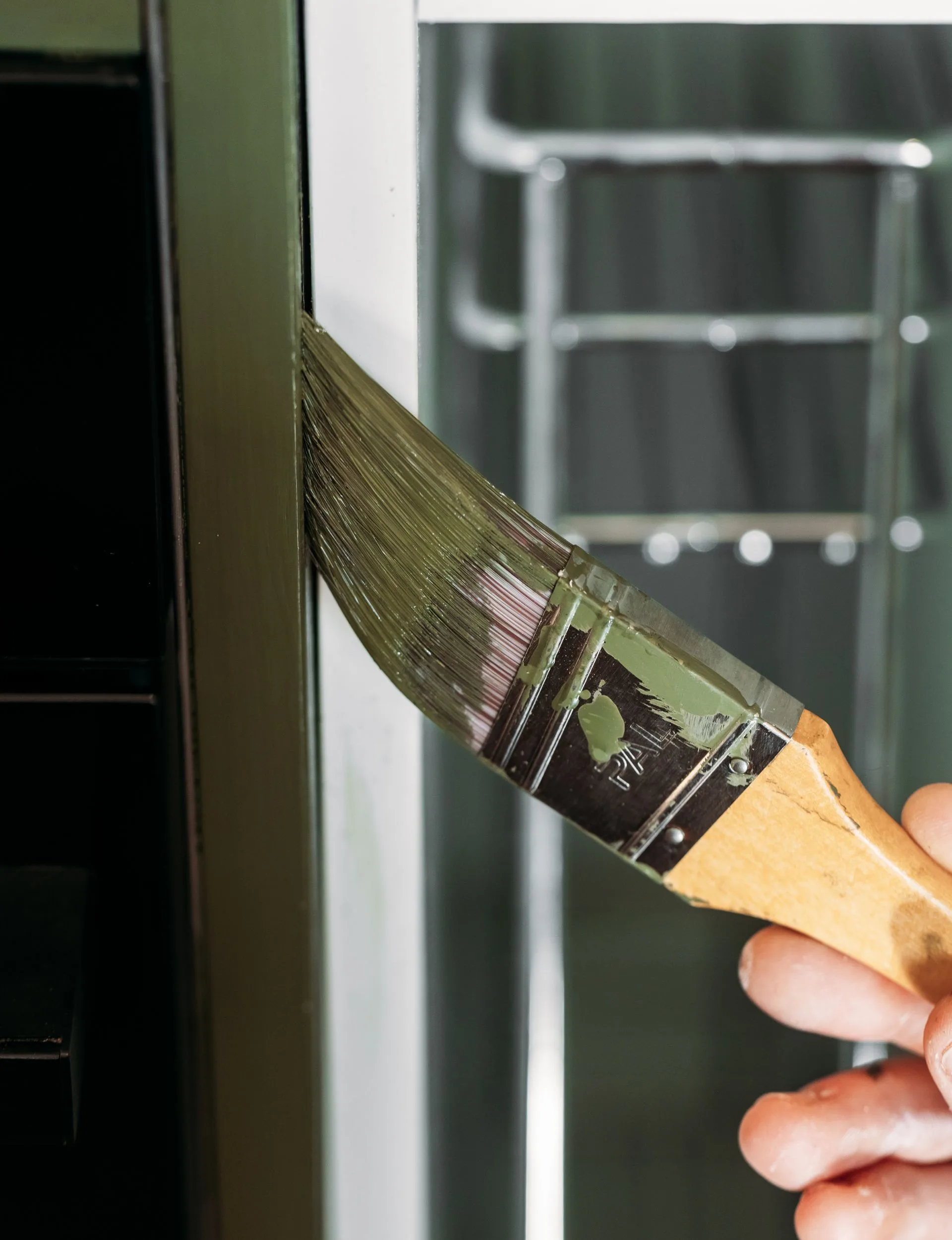 Use a fine brush to go over the areas the paint roller can't reach